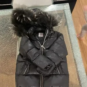 Pramie sales down coat